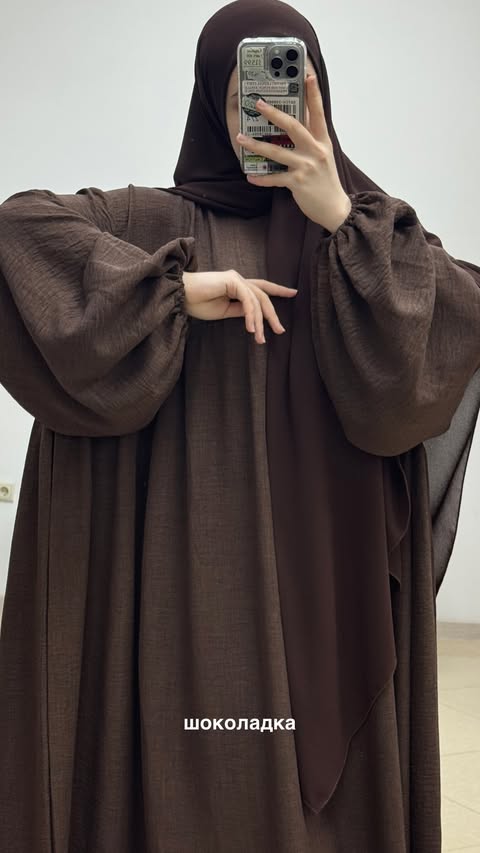 عباية  بلمسة عصرية محتشمة